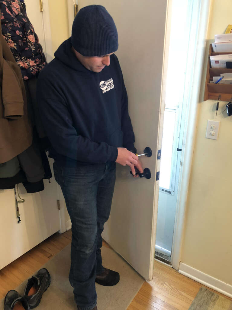 locksmith replacing a look at home